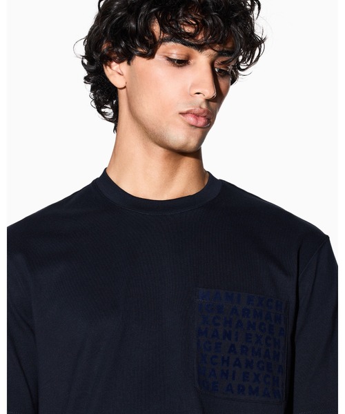 ARMANI EXCHANGE(アルマーニエクスチェンジ)の「【A|X アルマーニ エクスチェンジ】オールオーバーロゴポケット 半袖クルーネックTシャツ/REGULAR+(Tシャツ/カットソー・メンズ・ダークネイビー/マスタード・LARGE/MEDIUM/SMALL/X-LARGE/X-SMALL/XX-LARGE)」の10枚目の写真