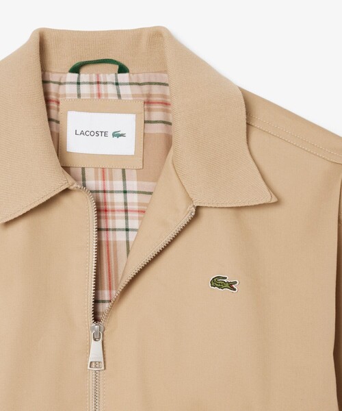 LACOSTE(ラコステ)の「クロップド丈 レイヤードニットカラージップアップジャケット(ブルゾン・レディース・ベージュ・38/36/34)」の14枚目の写真
