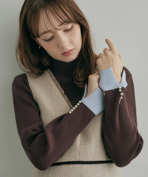 couture brooch(クチュールブローチ)の「【配色デザインがこなれ見え】袖口スリット パール調リブニット【吸湿発熱・静電気防止・抗菌防臭・洗濯機可】(ニット/セーター・レディース・ネイビー/ブラウン系その他/ブラック・38/42/40/36)」の1枚目の写真