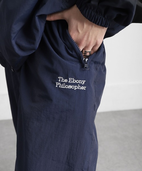 ZIP FIVE(ジップファイブ)の「【ZIP FIVE】 ワンポイント 刺繍 ドローコード内蔵 ナイロン トラックパンツ 【セットアップ可能】(その他パンツ・メンズ・ブルー/ネイビー/ブラック/チャコール・LARGE/MEDIUM)」の16枚目の写真