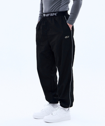 MIHAK（ミハク）の「シグネチャーバンドナイロンジョガーパンツ（ブラック）（スウェットパンツ）」