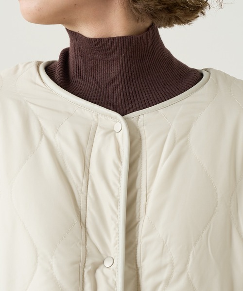 Omekashi（オメカシ）の「リバーシブルキルティングコート（ノーカラーコート・レディース・オフホワイト/ブラック・FREE）」の4枚目の写真