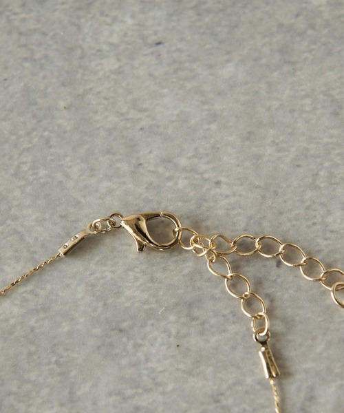 un dix cors（アンディコール）の「クリアボールネックレス（ネックレス・レディース・レッド/ホワイト・FREE）」の5枚目の写真