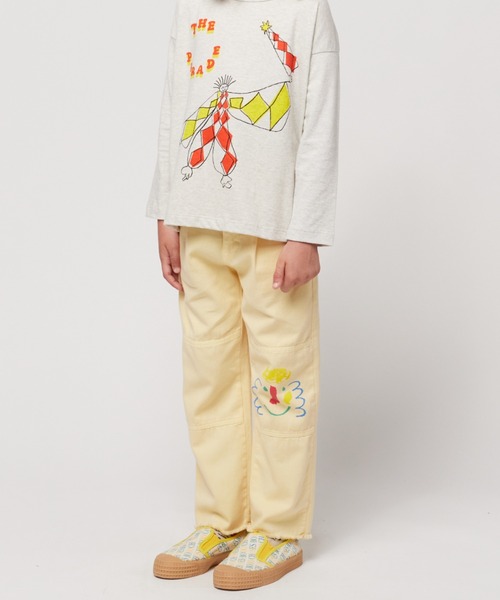 BOBO CHOSES(ボボショーズ)の「Happy Mask chino pants(チノパンツ・キッズ・ライトイエロー・4-5YEAR/2y-3y/12Y-14Y/8Y-10Y/6-7YEAR/10Y-12Y)」の1枚目の写真