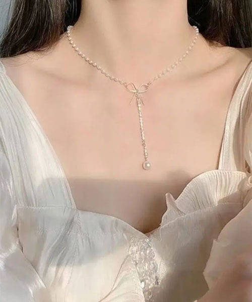 TONE SELECT GOODS（トーンセレクトグッズ）の「【float】リボン モチーフ パールチェーン ラインストーン Y字ネックレス/チョーカー（ネックレス・レディース・ゴールド・FREE）」の2枚目の写真