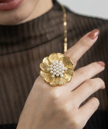 abaskdesign（アバスクデザイン）の「金属アレルギー対応 フラワーパールインパクトリング（リング）」