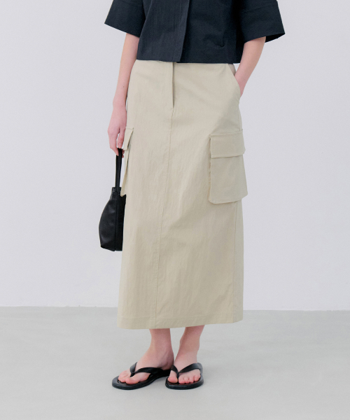 NOTIA(ノティア)の「ANORAK CARGO SKIRT - BEIGE(スカート・レディース・Beige・SMALL/MEDIUM/LARGE)」の1枚目の写真