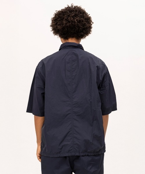 UNFRM OUTDOOR STANDARD(ユニフォームアウトドアスタンダード)の「UNFRM OUTDOOR STANDARD PE TYPEWRITER AFRICAN EMBROIDERY S/S WORK SHIRT(ユニフォームアウトドアスタンダード PE タイプライター アメリカン エンブロイダリー ショートスリーブ ワークシャツ)(シャツ/ブラウス・メンズ・オフホワイト/ネイビー・MEDIUM/SMALL)」の22枚目の写真