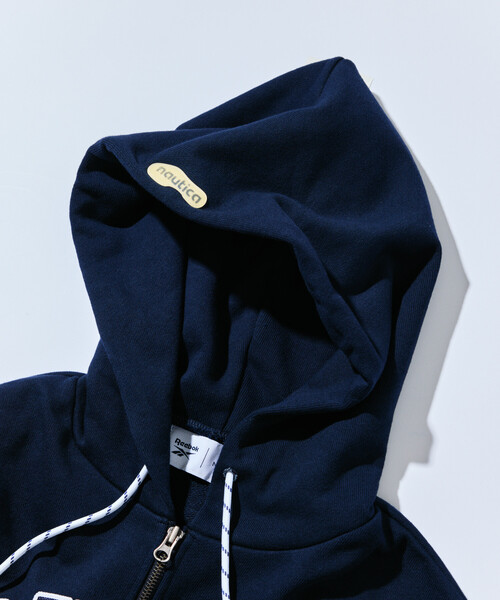FREAK'S STORE(フリークスストア)の「Reebok × NAUTICA/リーボック × ノーティカ 【Exclusive】 ヘビーウェイト ダブルネームアーチロゴ ジップフーディー/クロップド丈 アーチロゴ スウェット/ジップパーカ(パーカー・レディース・ライトグレー/ネイビー・フリ-)」の8枚目の写真