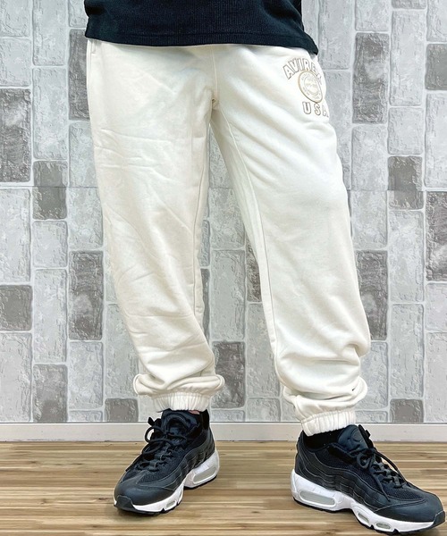 AVIREX(アヴィレックス)の「AVIREX 50th VARSITY SWEAT PANTS(スウェットパンツ・メンズ・エンジ/ホワイト/チャコールグレー・M/L/XL/XXL)」の1枚目の写真