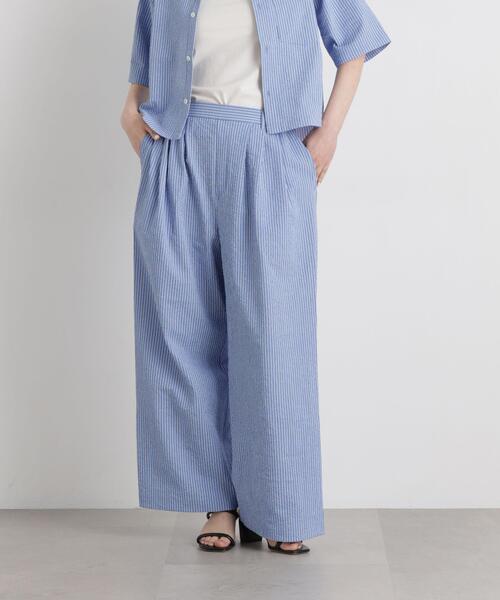 THOUSAND MILE(サウザンドマイル)の「THOUSAND MILE/SEERSUCKER STRIPE WIDE PANTS(セットアップ可)(その他パンツ・レディース・ライトブルー・L/M)」の1枚目の写真