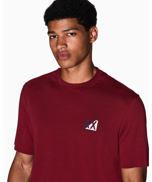 ARMANI EXCHANGE(アルマーニエクスチェンジ)の「【A|X アルマーニ エクスチェンジ】AXロゴ 半袖クルーネックTシャツ/REGULAR+(Tシャツ/カットソー・メンズ・レッド/ブラック・XX-LARGE/X-LARGE/LARGE/MEDIUM/SMALL/X-SMALL)」の1枚目の写真