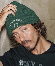 seventy seven（セブンティセブン）の「mko13168-embroidery knit cap(77arch) ニットキャップ(7725W320)（ニットキャップ/ビーニー）」