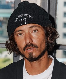 seventy seven（セブンティセブン）の「mko13168-embroidery knit cap(77arch) ニットキャップ(7725W320)（ニットキャップ/ビーニー）」