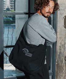 seventy seven（セブンティセブン）の「mko13169-embroidery newspaper bag(77arch) ニュースペーパーバッグ(7725W330)（ショルダーバッグ）」