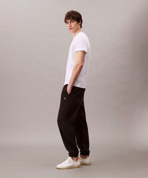 Calvin Klein(カルバン・クライン)の「アーカイブ ロゴ ジョガーパンツ(スウェットパンツ・メンズ・グレー/ブラック・L/M/S)」の6枚目の写真