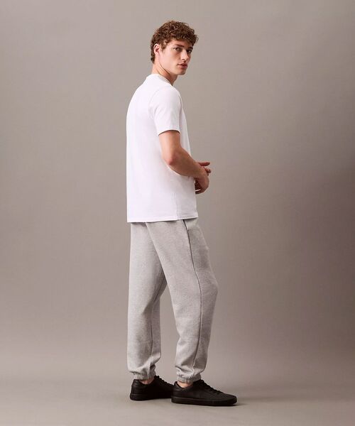 Calvin Klein(カルバン・クライン)の「アーカイブ ロゴ ジョガーパンツ(スウェットパンツ・メンズ・グレー/ブラック・L/M/S)」の8枚目の写真