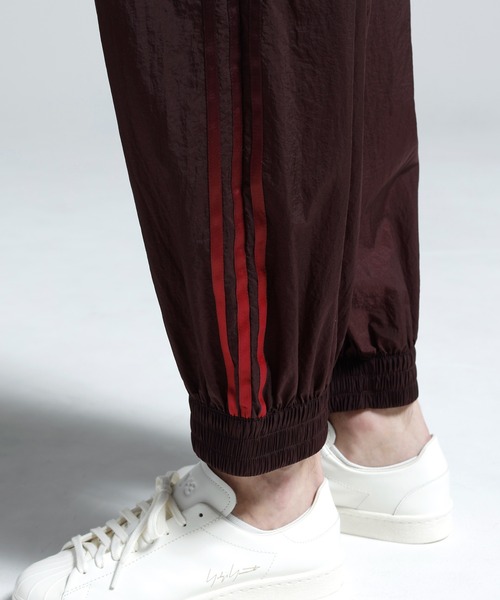 Y-3(ワイスリー)の「Y-3 GRADIENT 3 STRIPES NYLON TRACK PANTS(その他パンツ・メンズ・バーガンディー・X-SMALL/SMALL/MEDIUM/LARGE)」の7枚目の写真