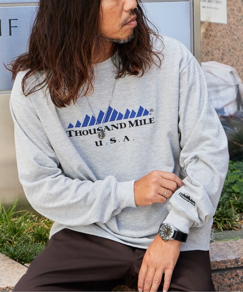 THOUSAND MILE(サウザンドマイル)の「THOUSAND MILE/サウザンドマイル LONG SLEEVE T-SHIRT TM LOGO ロンT フロントプリント ブランドロゴ 刺繍 ドロップショルダー アウトドア 2026秋冬 秋服(Tシャツ/カットソー・メンズ・ホワイト/ブラック/グレー・M/L/XL/XS)」の16枚目の写真