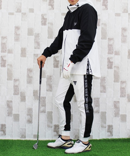 TopIsm（トップイズム）の「ロゴデザインナイロンジャケット＆ジョガーパンツ ゴルフセットアップ ゴルフウェア（ゴルフグッズ・メンズ・ホワイト/ブラック/ホワイト系その他/ブラック系その他・M/L/XL）」の2枚目の写真