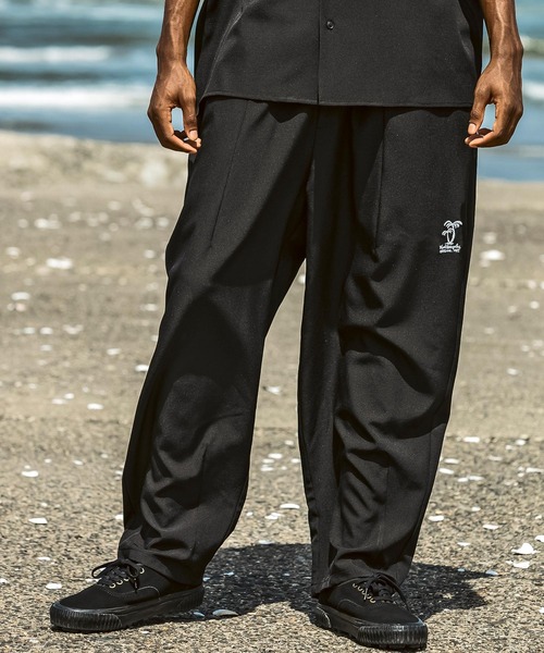 Mark Gonzales（マーク・ゴンザレス）の「【WEB・直営店限定】MARK GONZALES ARTWORK COLLECTION(マーク ゴンザレス)パームツリー刺繍 ワイドパンツ バルーンパンツ（その他パンツ・メンズ・ブラウン/ブラック・M/L/XL）」の2枚目の写真