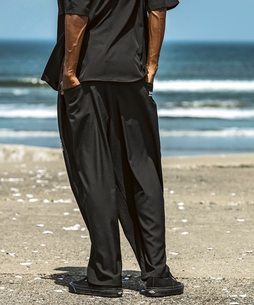 Mark Gonzales（マーク・ゴンザレス）の「【WEB・直営店限定】MARK GONZALES ARTWORK COLLECTION(マーク ゴンザレス)パームツリー刺繍 ワイドパンツ バルーンパンツ（その他パンツ・メンズ・ブラウン/ブラック・M/L/XL）」の4枚目の写真