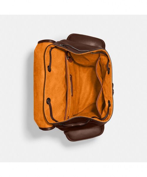 COACH リュック・バックパック ブラウン・オレンジ COACH（コーチ）の「リーグ フラップ バックパック カラー
