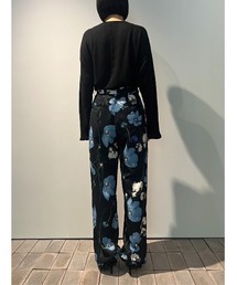CLANE（クラネ）の「CLANE MULTICOLORED FLOWER WIDE PANTS