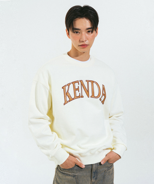 KENDA(ケンダ)の「ARCH LOGO MTM (IVORY)(スウェット・レディース・アイボリー・SMALL/MEDIUM/X-LARGE)」の1枚目の写真