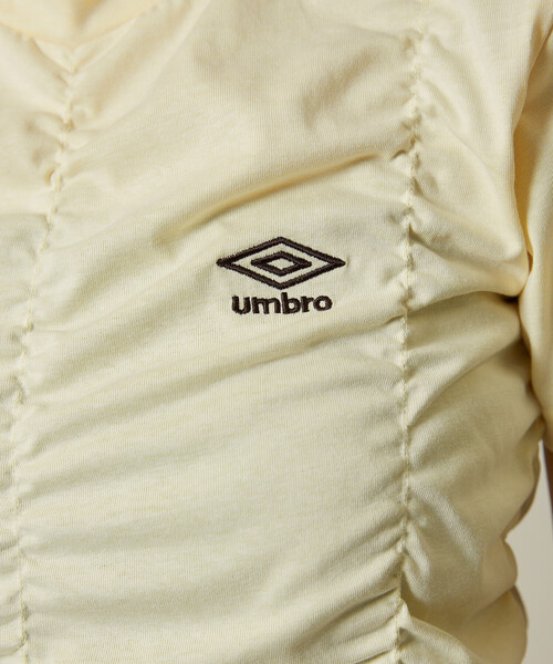 UMBRO(アンブロ)の「UMBRO × PUBLUX/アンブロ 別注 ワンポイント 刺繍 ギャザー Tシャツ 限定展開(Tシャツ/カットソー・レディース・イエロー/ネイビー/ブラウン・フリ-)」の16枚目の写真