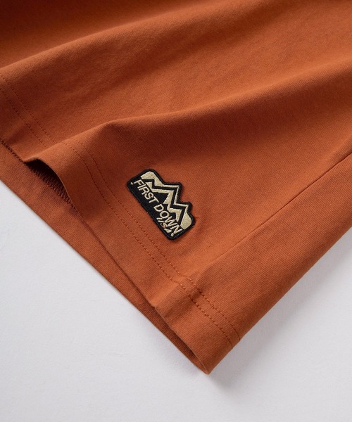 FIRST DOWN(ファーストダウン)の「【76】【FIRST DOWN USA/ファーストダウン USA】グラフィック ロゴプリント クルーネックTシャツ/ワンポイントワッペン/バックプリント(Tシャツ/カットソー・メンズ・カーキ/ホワイト系その他2/ブラック/オレンジ/ホワイト系その他/ホワイト・M/S)」の21枚目の写真