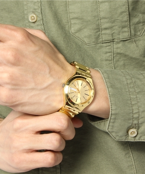 BEAUTY&YOUTH UNITED ARROWS（ビューティーアンドユースユナイテッドアローズ）の「＜SWATCH＞ YELLOW MEDAL¨（アナログ腕時計・メンズ・ゴールド・フリー）」の2枚目の写真