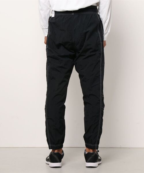 NIKE（ナイキ）の「NIKE AS M NSW WR LND WVN PANT SW5 DM6859