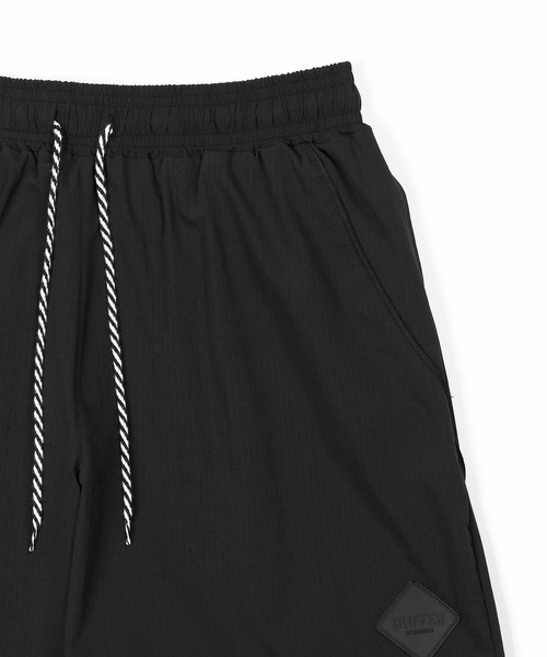 The DUFFER of ST.GEORGE(ザダファーオブセントジョージ)の「〔BLACK LABEL〕CORDURA RIPSTOP TRUCK SHORTS:セットアップ コーデュラリップストップ トラックショーツ(その他パンツ・メンズ・ブラック・SMALL/MEDIUM/LARGE/X-LARGE)」の7枚目の写真