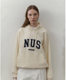 HUKE（ヒューク）の「Nus ロゴ フードパーカー (アイボリー)（パーカー）」