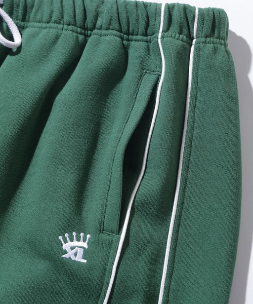 XLARGE(エクストララージ)の「EMBROIDERED LOGO PIPING SWEATPANTS(スウェットパンツ・メンズ・グリーン/ネイビー/ブラック・M/L/XL/S)」の7枚目の写真