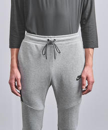 ナイキ　テックパンツ NIKE（ナイキ）の「＜NIKE（ナイキ）＞ ﾃｯｸﾌﾘｰｽ ｼﾞｮｶﾞｰﾊﾟﾝﾂ