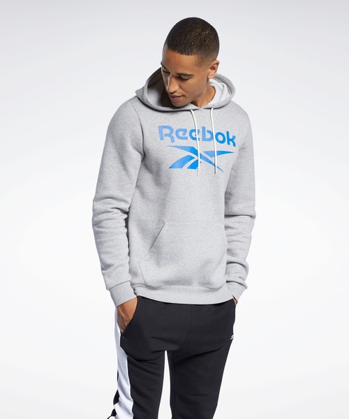 Reebok(リーボック)の「トレーニング エッセンシャルズ ビッグ ロゴ フーディー / Training Essentials Big Logo Hoodie(パーカー・メンズ・ブラック/レッド/ヘザーグレー/アーミー/ブラック×ブルー・SMALL/MEDIUM/LARGE/X-LARGE/XX-LARGE/X-SMALL/XXX-LARGE)」の3枚目の写真