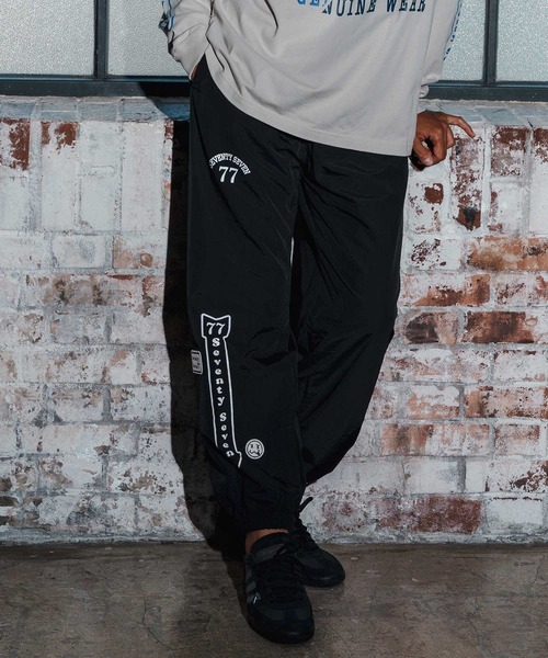seventy seven(セブンティセブン)の「mp14174-nylon training pants(25W) ナイロンパンツ(7725W280)(その他パンツ・メンズ・ブラック×ホワイト/ブラック×ゴールド・XL/L/M/S)」の1枚目の写真