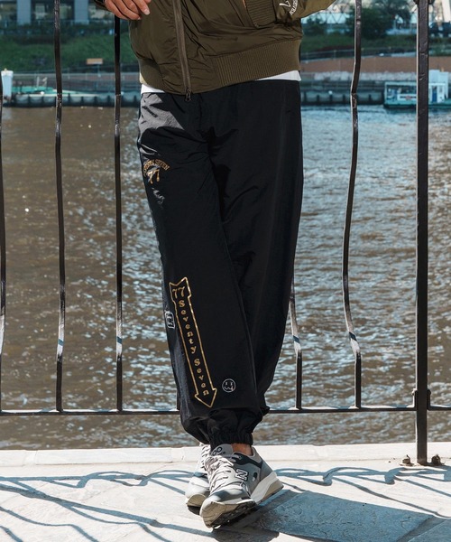 seventy seven(セブンティセブン)の「mp14174-nylon training pants(25W) ナイロンパンツ(7725W280)(その他パンツ・メンズ・ブラック×ホワイト/ブラック×ゴールド・XL/L/M/S)」の2枚目の写真