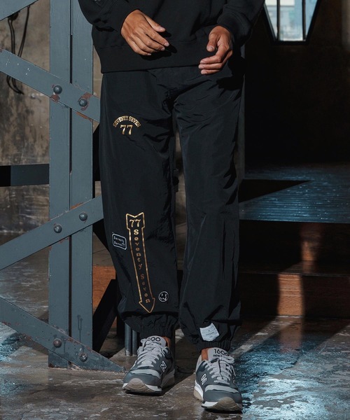 seventy seven(セブンティセブン)の「mp14174-nylon training pants(25W) ナイロンパンツ(7725W280)(その他パンツ・メンズ・ブラック×ホワイト/ブラック×ゴールド・XL/L/M/S)」の3枚目の写真