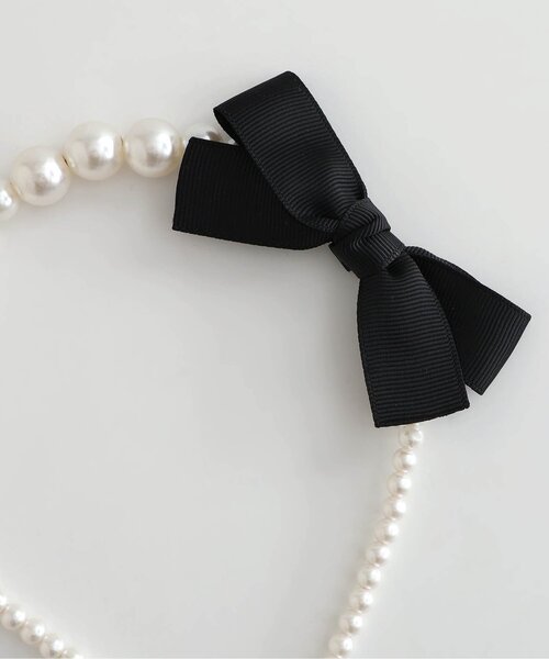 apres les cours（アプレレクール）の「パールリボンカチューシャ（カチューシャ・キッズ・アイボリー・FREE）」の6枚目の写真