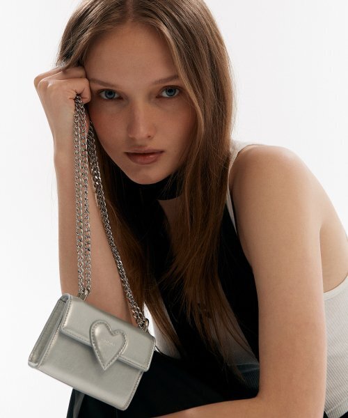 CHRISTINE PROJECT(クリスティンプロジェクト)の「TWIST HEART MICRO BAG(SILVER GLASS)(メッセンジャーバッグ・レディース・その他・FREE)」の1枚目の写真
