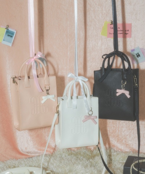 JILL by JILL STUART(ジルバイジルスチュアート)の「Link J ミニトートバッグ(ショルダーバッグ・レディース・ホワイト/ブラック/ピンク・FREE)」の1枚目の写真