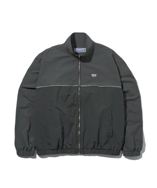 DISCUS ATHLETIC(ディスカス アスレチック)の「ロゴトラックジャケットチャコール(ナイロンジャケット・レディース・その他・MEDIUM/LARGE)」の1枚目の写真