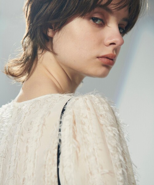 GRACE CONTINENTAL（グレースコンチネンタル）の「フリンジパフトップ