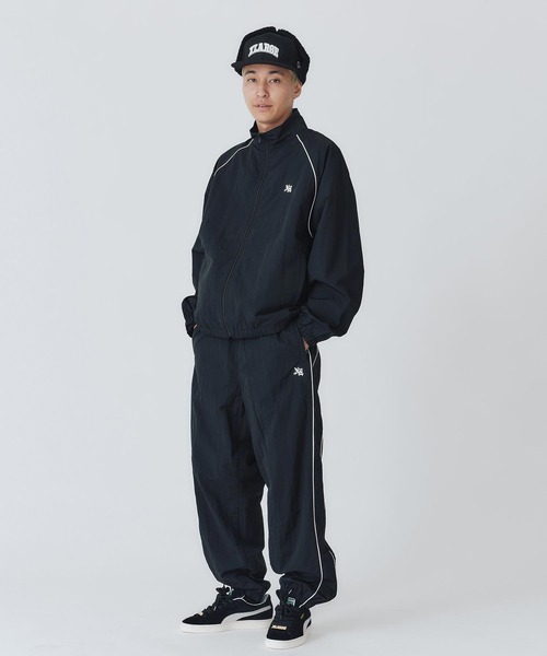 XLARGE（エクストララージ）の「OLD ENGLISH NYLON TRACK PANTS