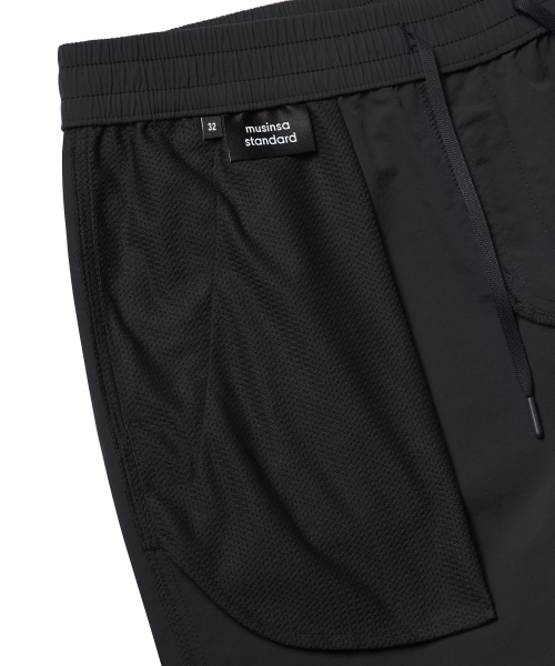 MUSINSA STANDARD（ムシンサスタンダード）の「ナイロンバンディングショーツ_5.5インチ [ブラック]（その他パンツ・メンズ・その他・32/30/26/28/36/34）」の5枚目の写真
