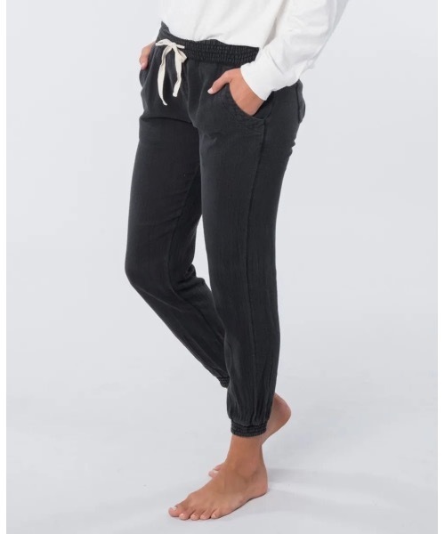 rip curl(リップカール)の「【RIPCURL(リップカール)】L CLASSIC SURF PANT スタンダードフィットポプリン素材ロングパンツ(その他パンツ・レディース・ブラック/ダークブラック・X-SMALL/SMALL)」の1枚目の写真