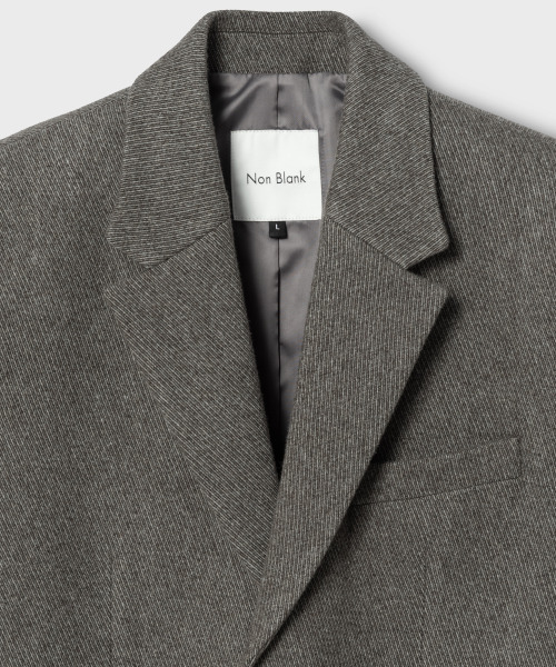 NONBLANK(ノンブランク)の「ウール100ツイルオーバーサイズジャケット_MELANGE TAUPE(テーラードジャケット・メンズ・グレー・LARGE/X-LARGE/MEDIUM)」の4枚目の写真